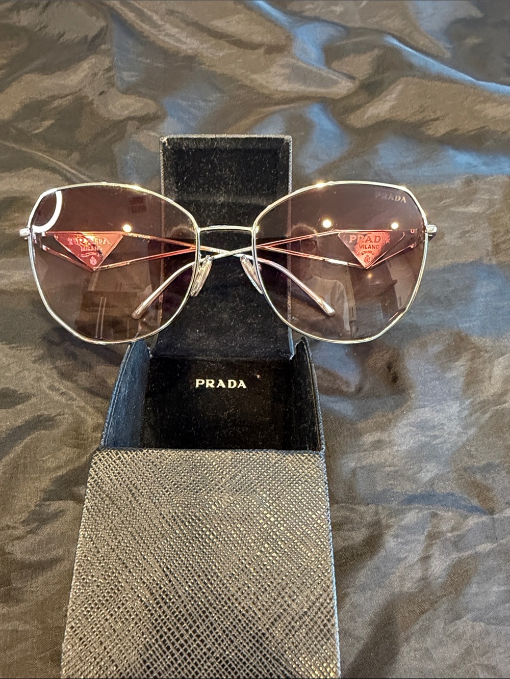 Silver Frame Prada Sunglasses with Pink Gradient Lenses